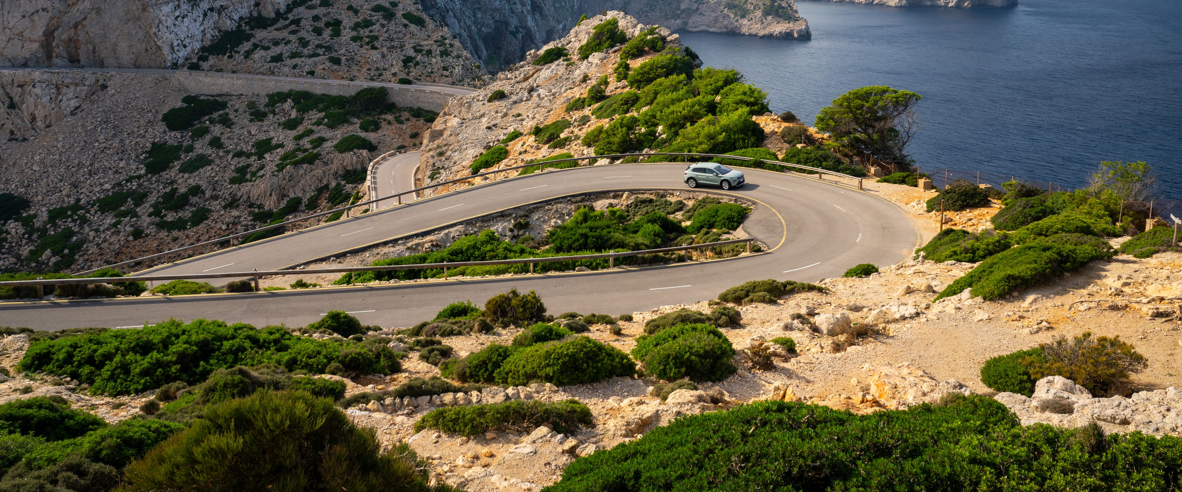 serpentine road with beautiful ocean view
